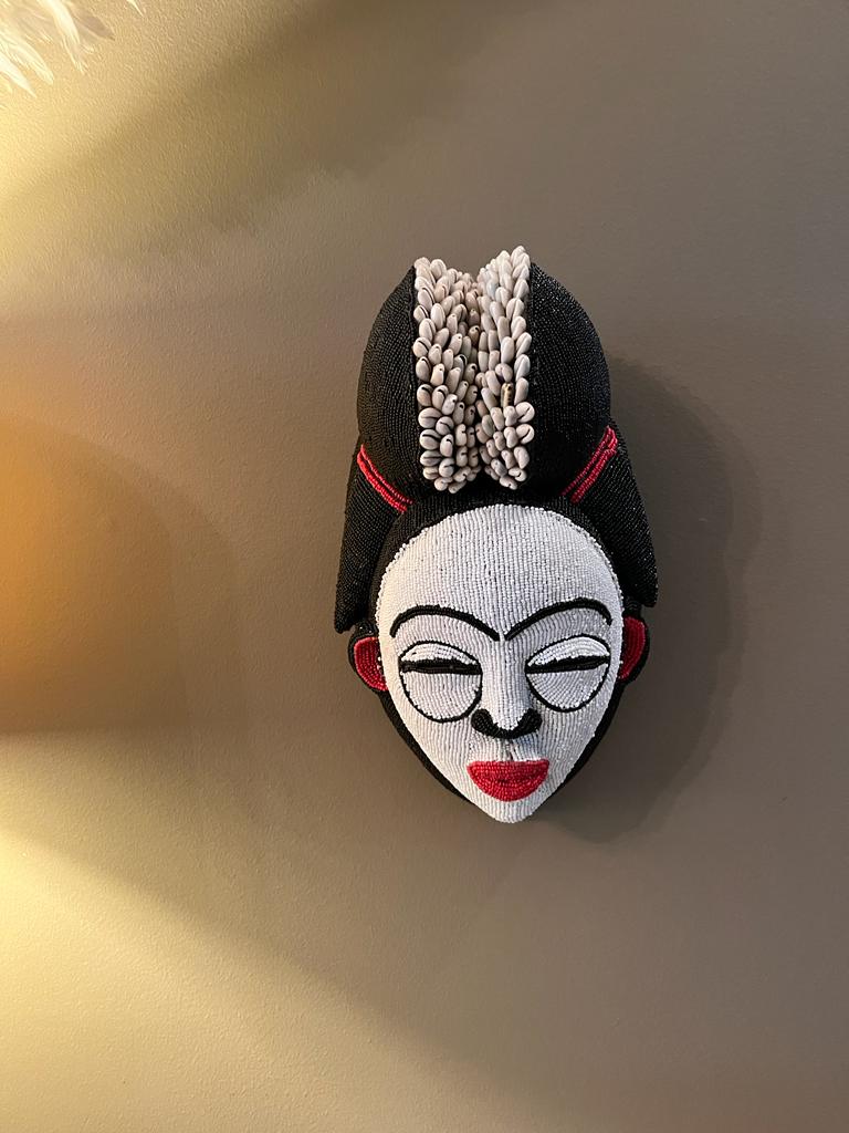 Wooden Punu Mask with Beads and Cowrie Shells.