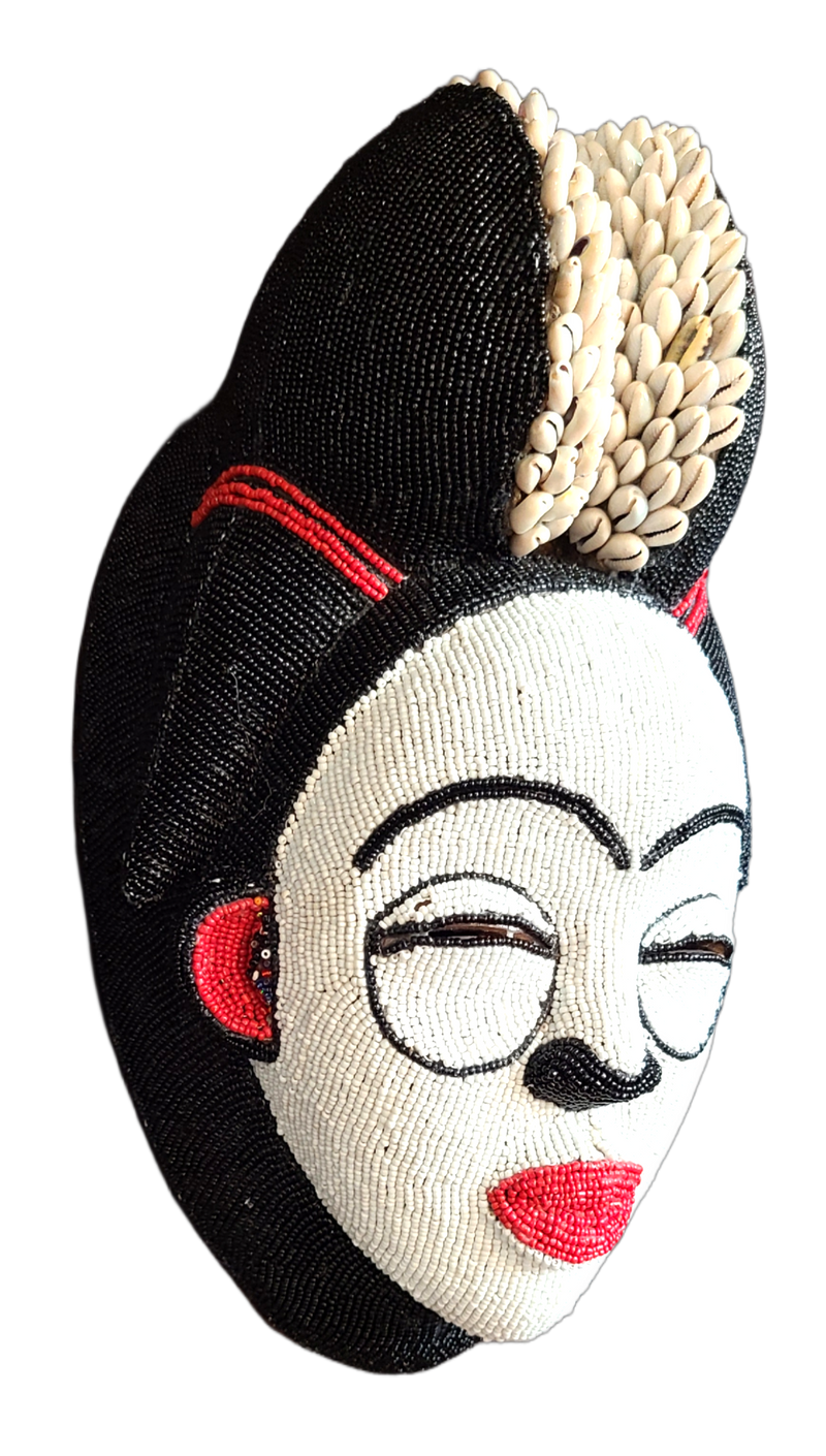 Wooden Punu Mask with Beads and Cowrie Shells.